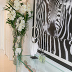 White Vanda Orchids and Driftwood Inside a Large Conical Glass Cylinder – Evervale