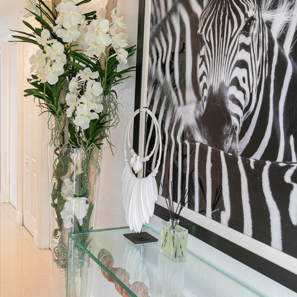 White Vanda Orchids and Driftwood Inside a Large Conical Glass Cylinder – Evervale