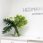 Lunar Vase with Green Cymbidiums and Callas – Evervale
